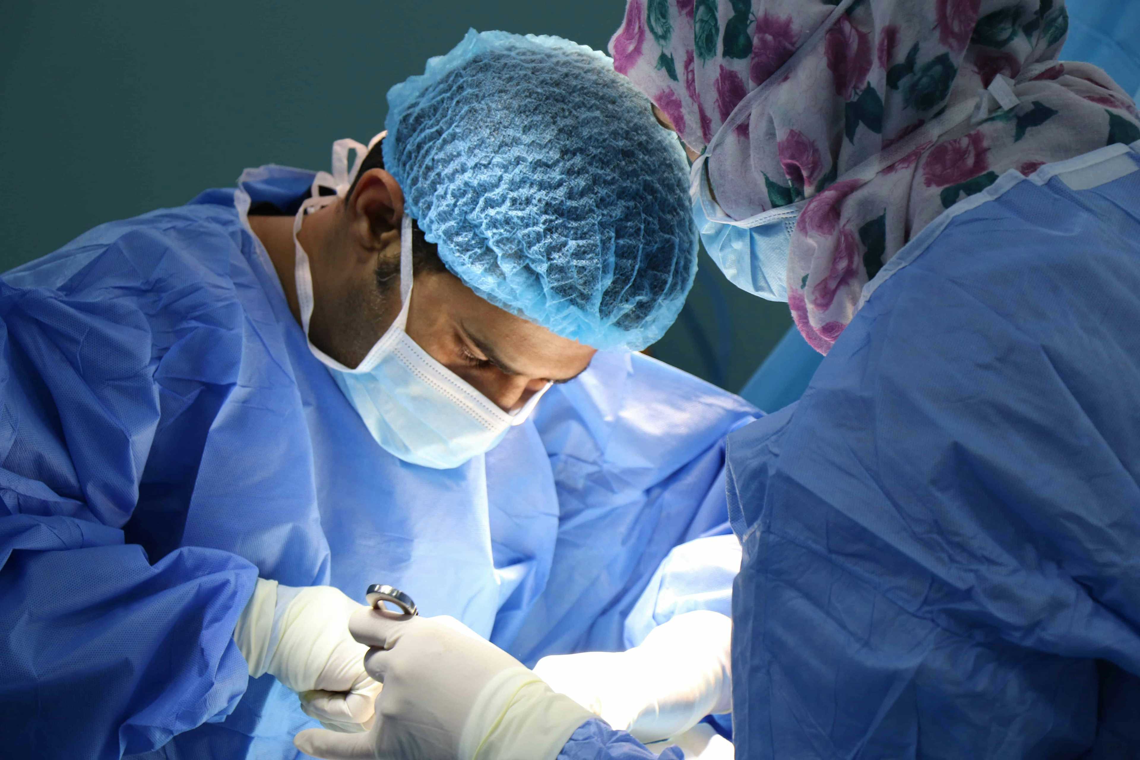 Surgeons performing c section