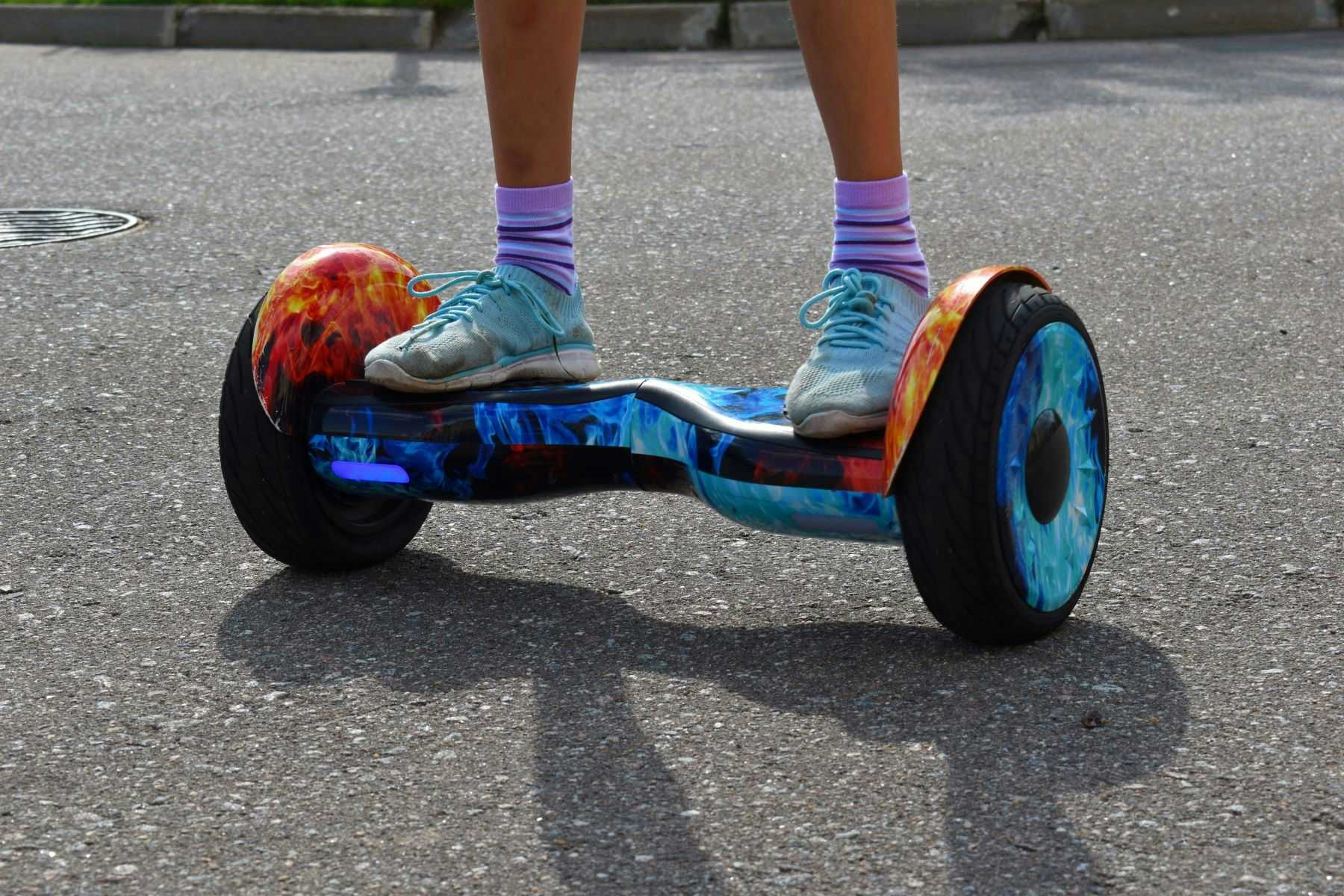 Child riding hoverboard