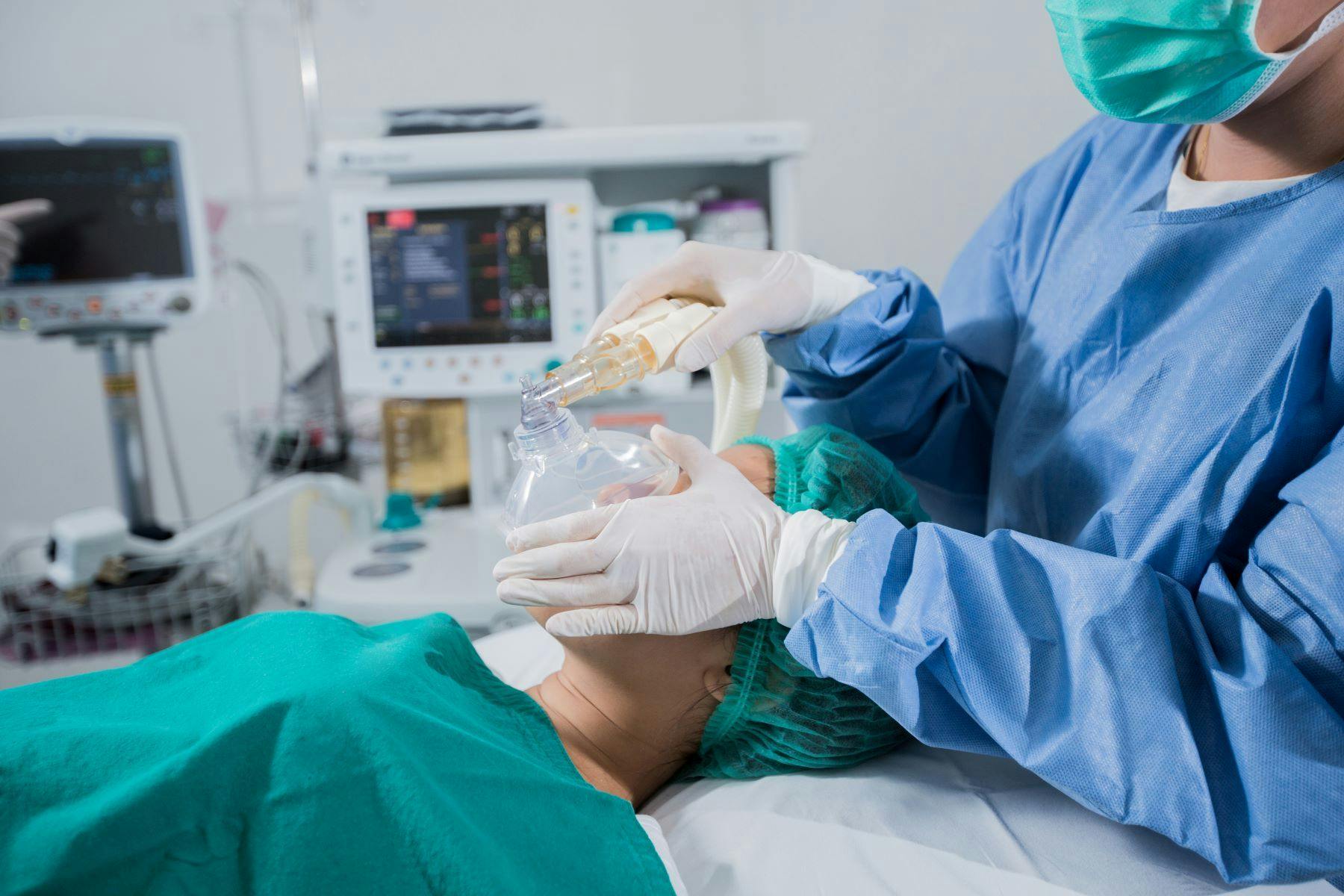 CRNA with patient in surgical procedure
