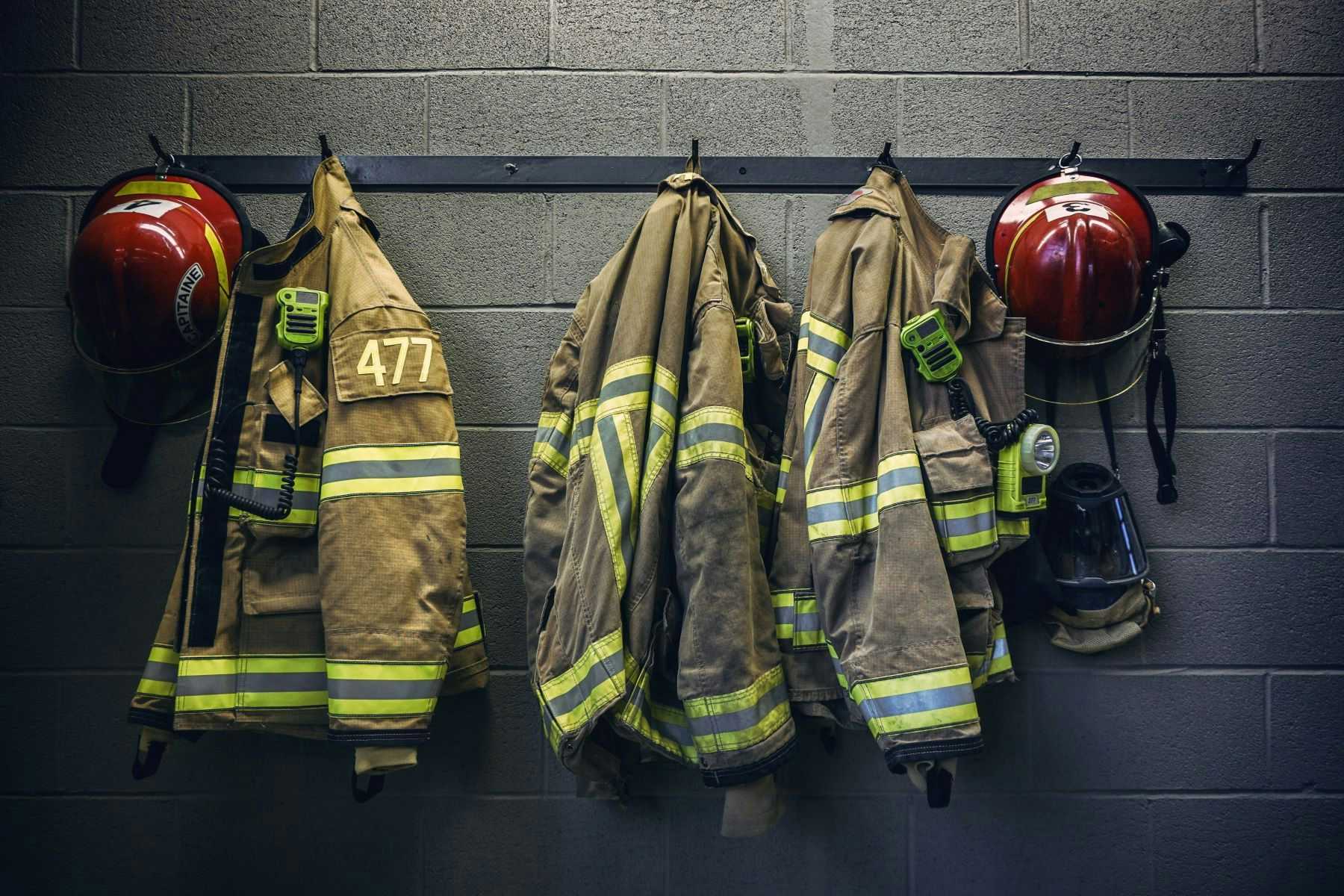 Firefighter jackets and helmets hanging