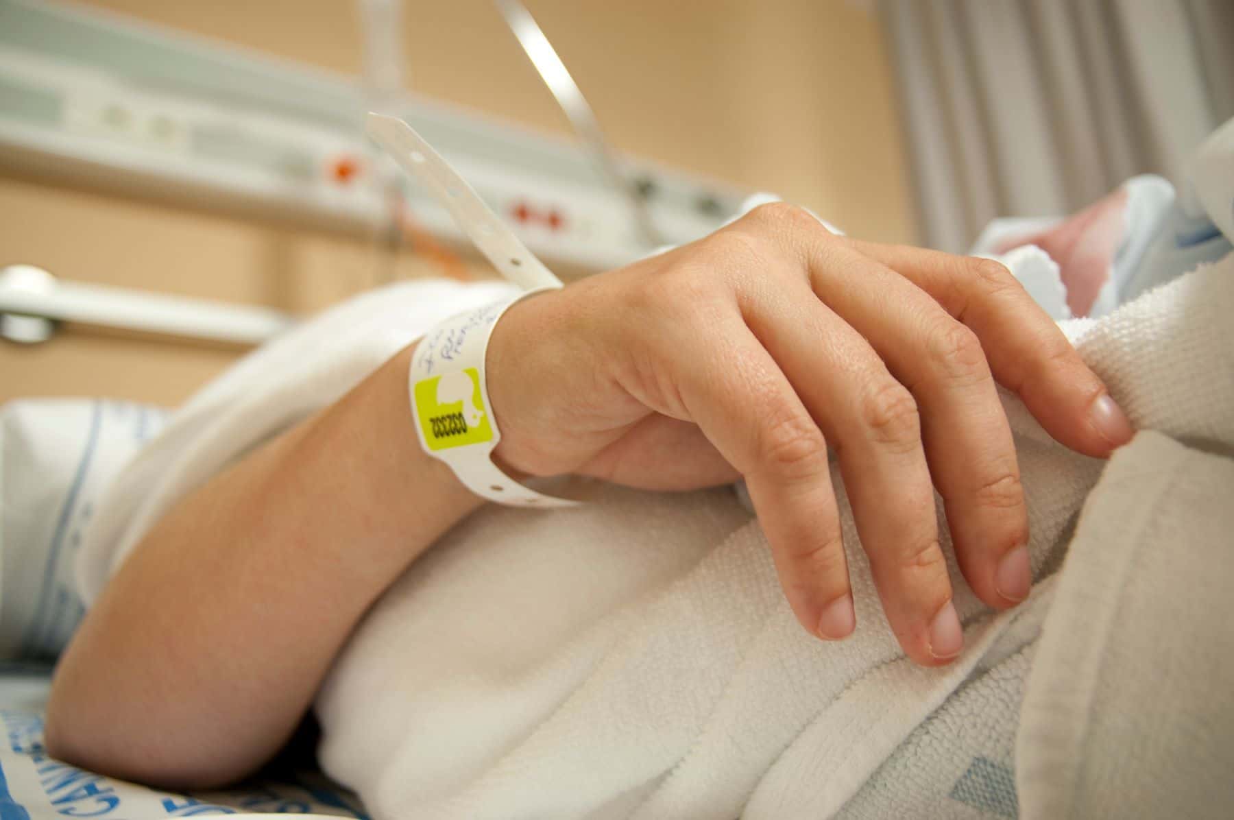 Patient in hospital bed