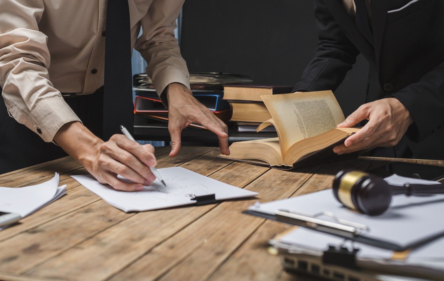 Attorneys reading legal material