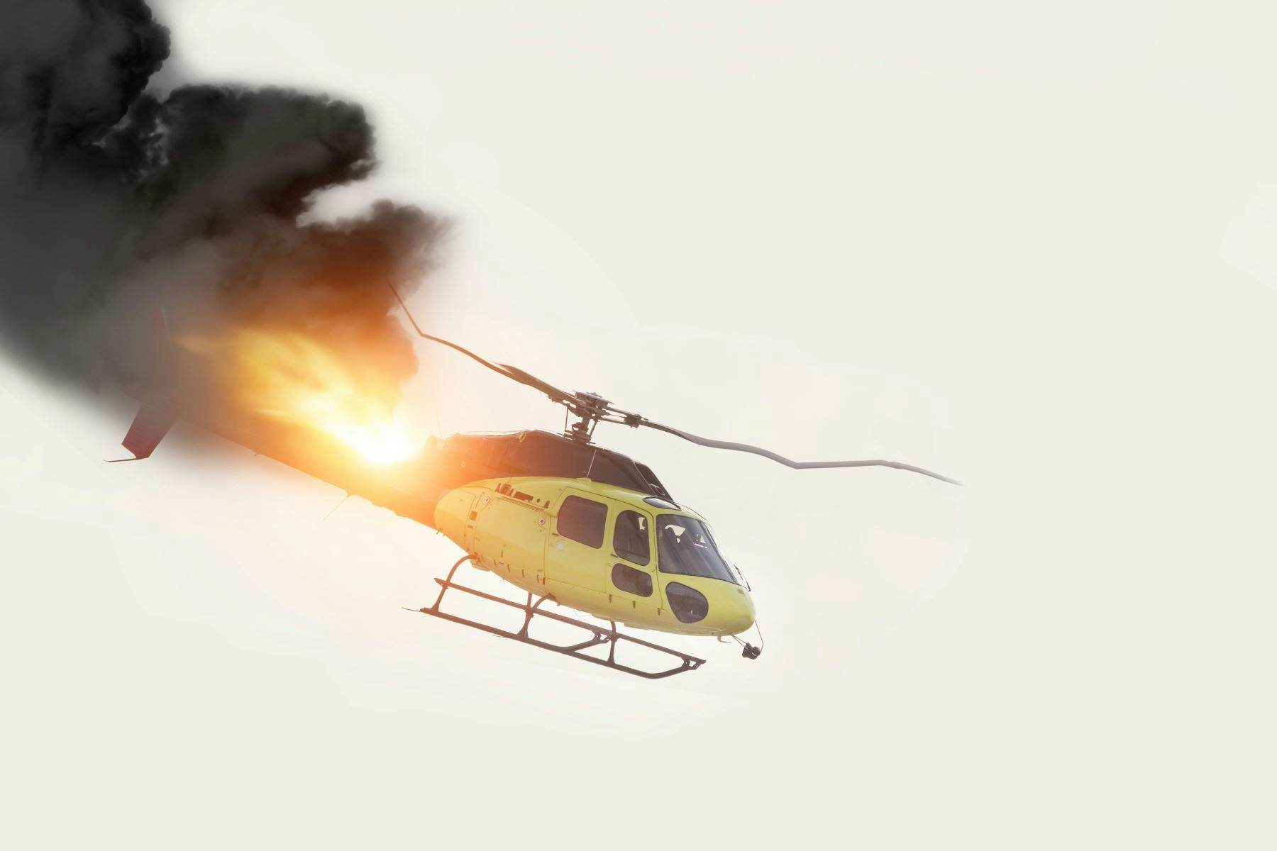 Falling helicopter in flames