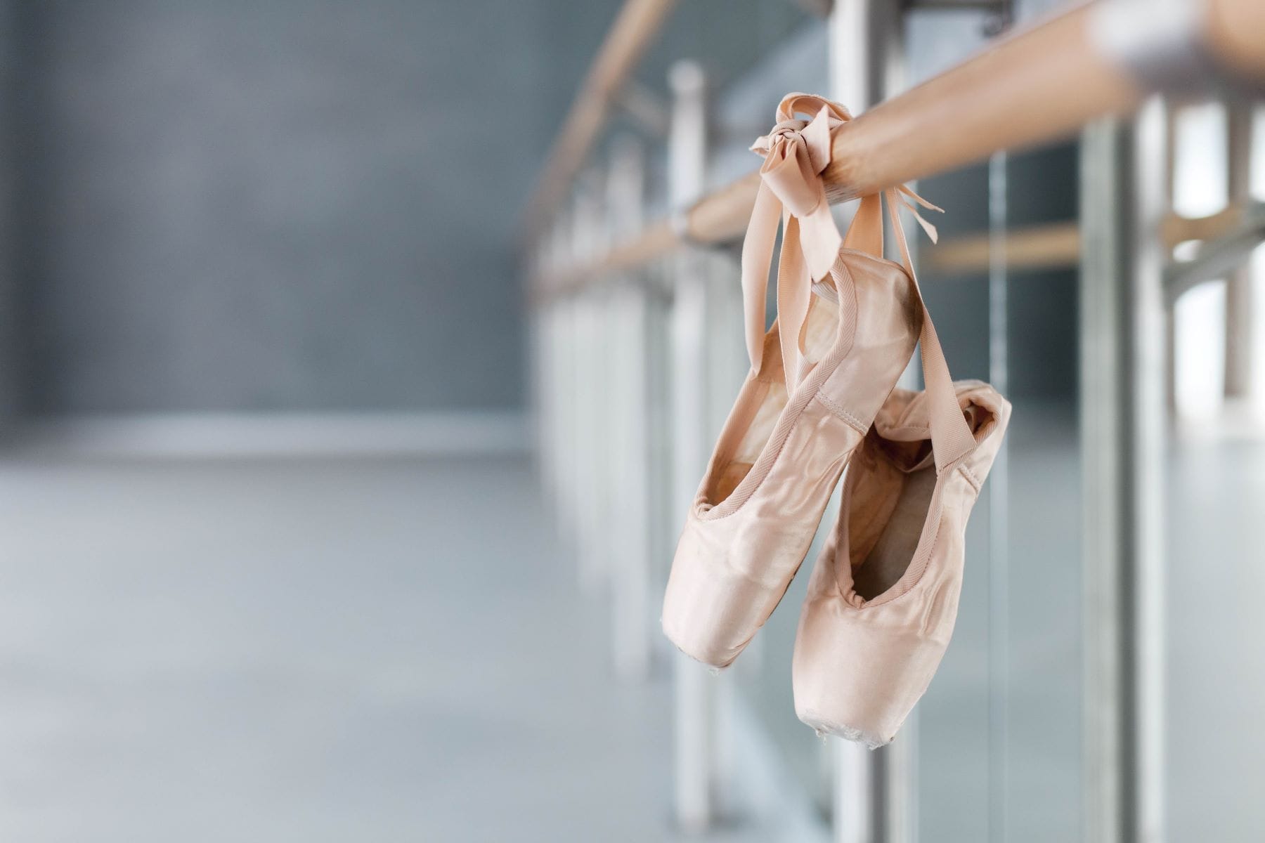 Ballet shoes on barre