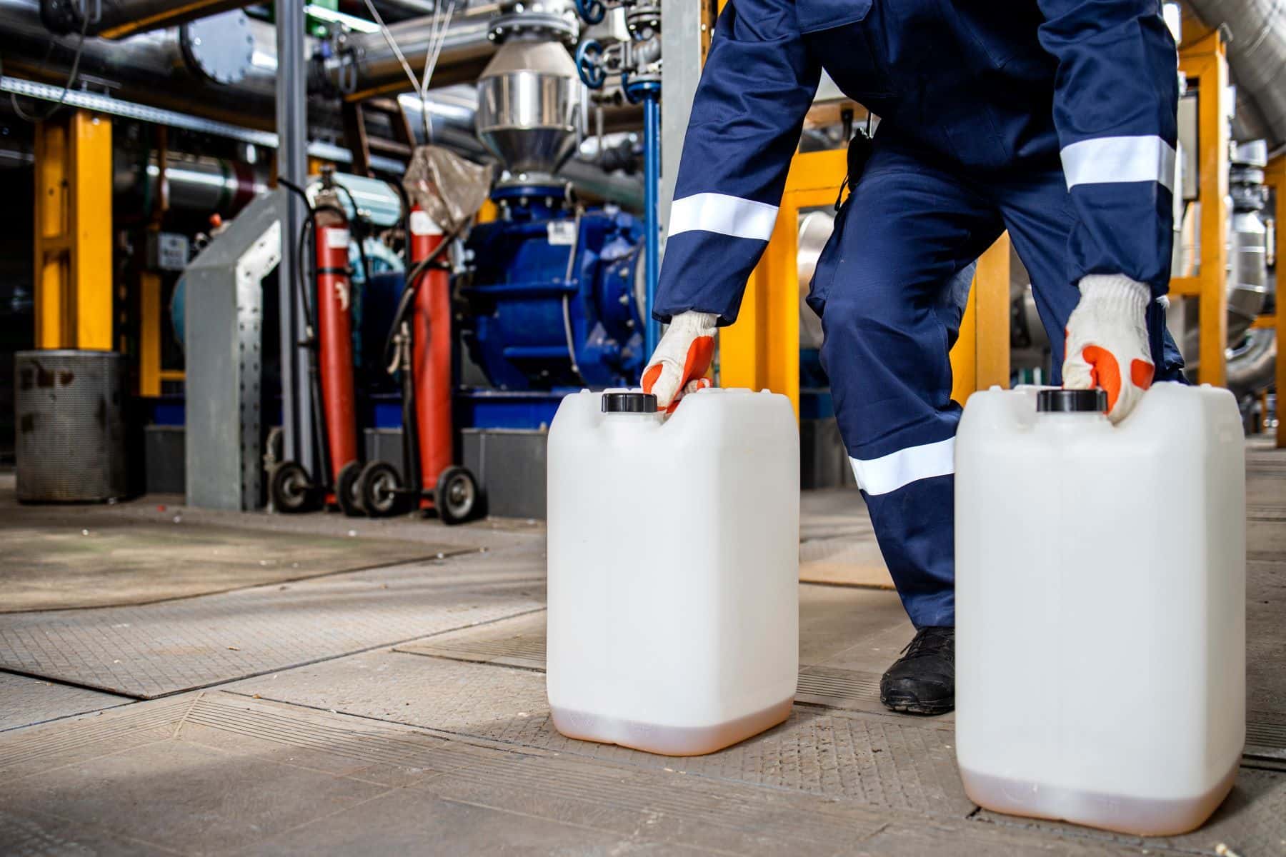 Worker lifting gas containers