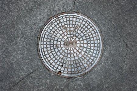 Woman Falls Into Sewer After Stepping on Loose Manhole Cover