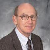 William Stephen Comanor, PhD